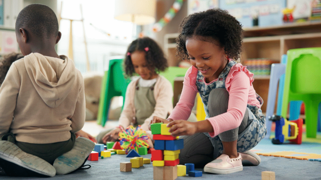 A happy child playing with blocks in a colorful daycare setting