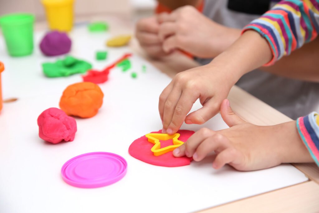 A vibrant daycare center with children engaged in various specialized programs like art, music, and outdoor play